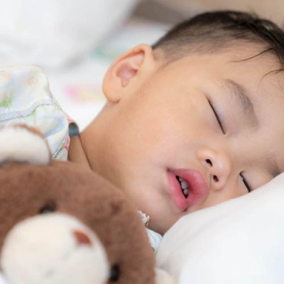 Child asleep in hospital